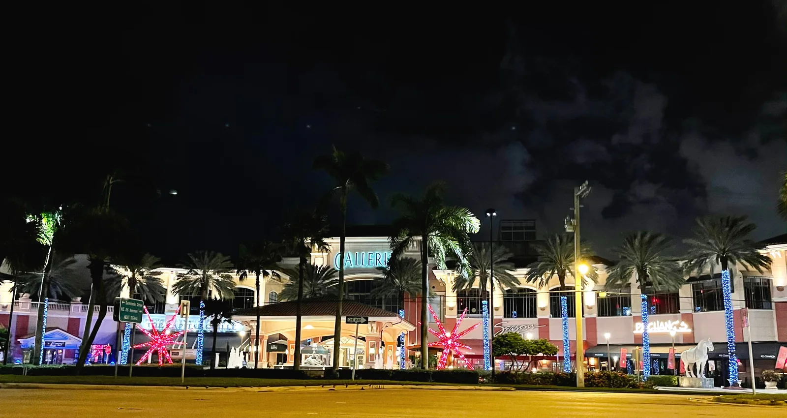 Galleria Fort Lauderdale on East Sunrise Boulevard, lit up for the holidays at night.