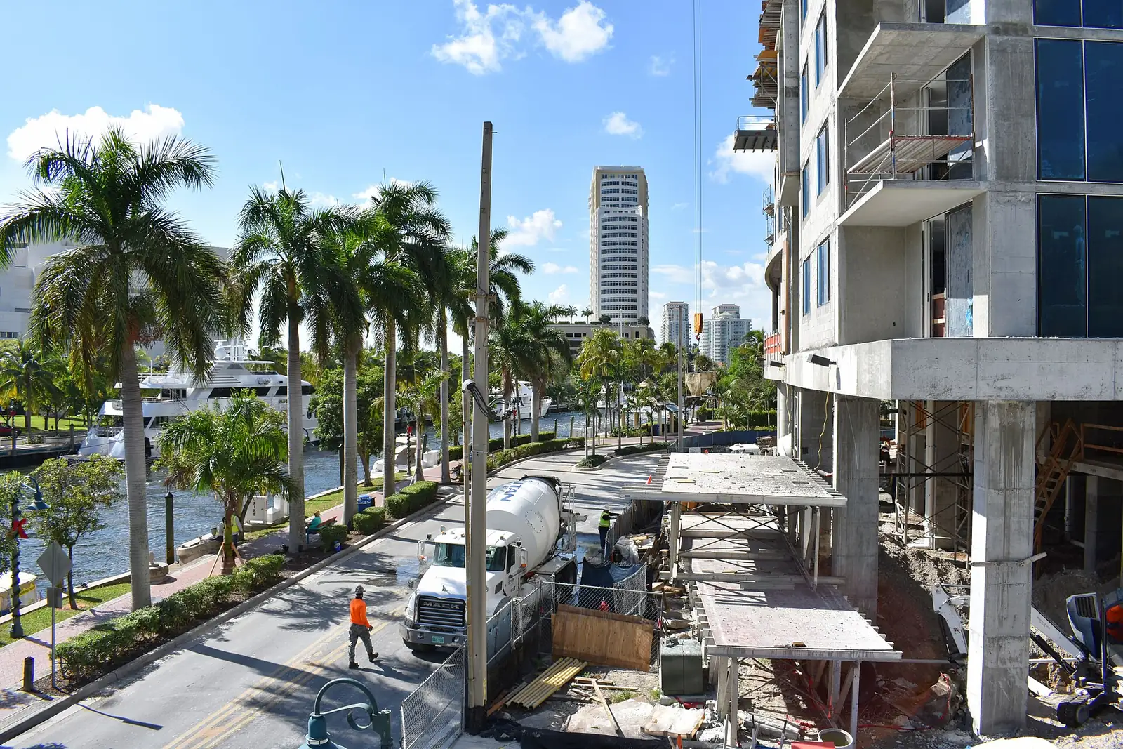 A building under construction beside the New River and the Riverwalk in downtown Fort Lauderdale.