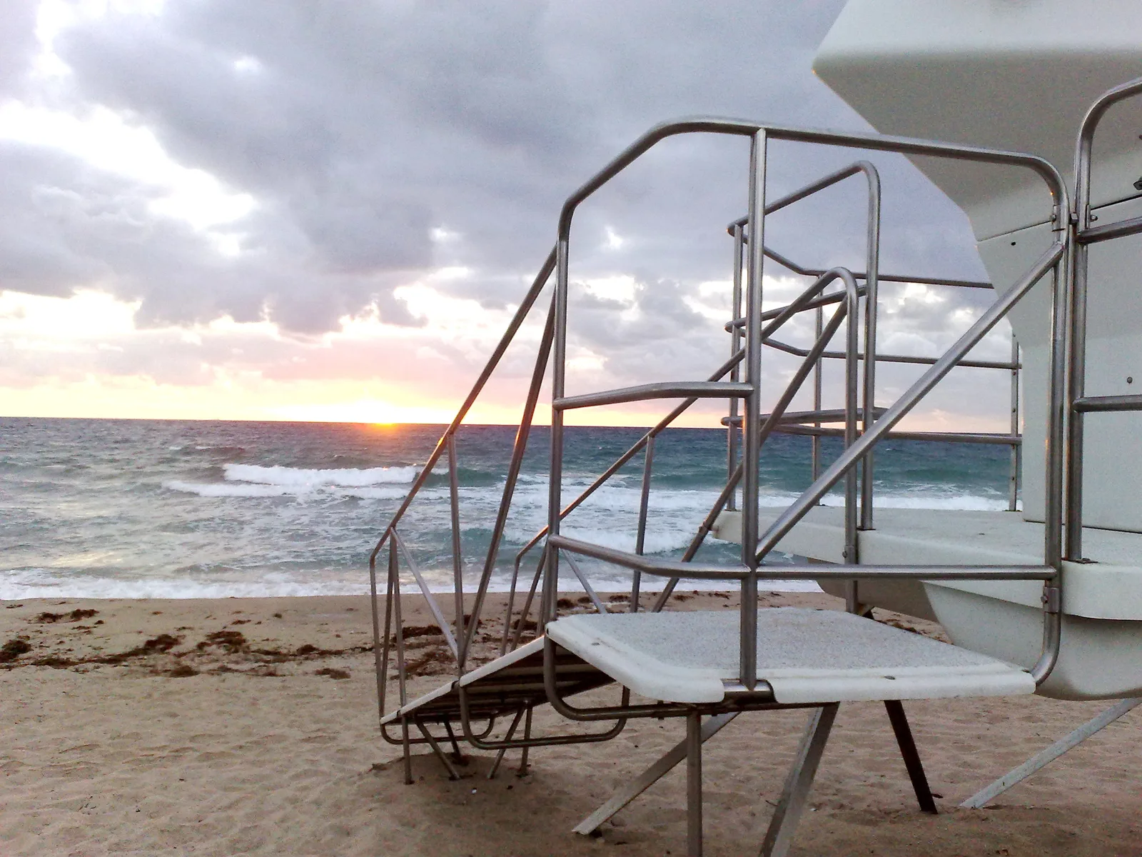 A lifeguard tower on Fort Lauderdale Beach at sunrise.